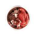 Stainless-steel bowl with True Carnivores branding, showcasing 100 Mile Raw Just Beef mix of red meat cuts, organ pieces, and bone fragments for pets.
