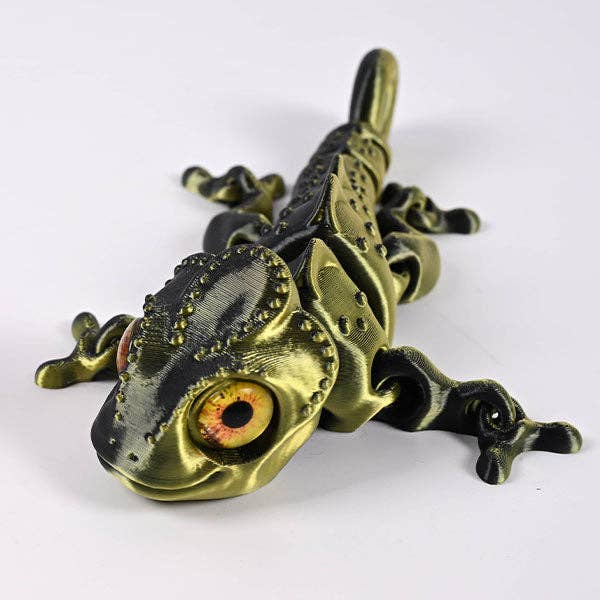 3D-printed articulated chameleon fidget toy with movable limbs and curling tail in vibrant color