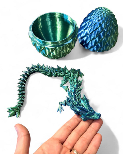 3D printed dragon with egg fidget toy in blue and green with articulated body and scale-textured egg