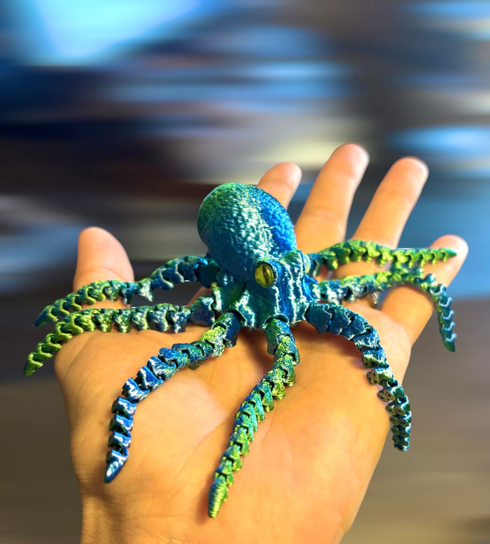 3D-printed articulated octopus fidget toy with fully movable tentacles in vibrant color