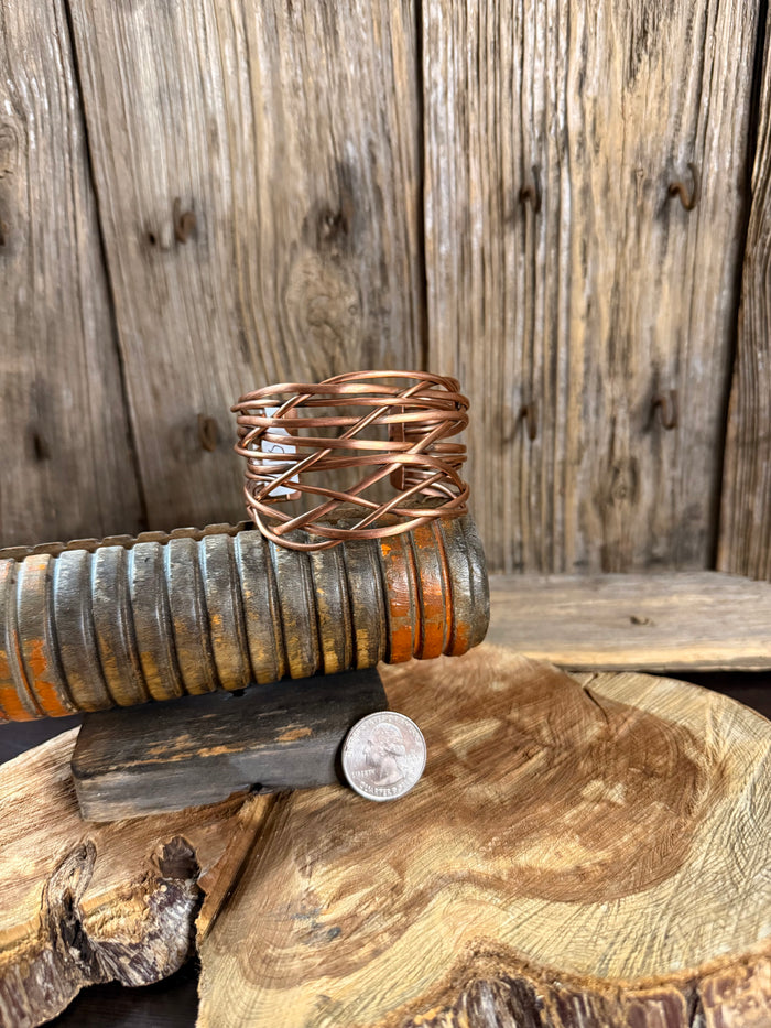 Copper wire cuff bracelet with open round twisted weave