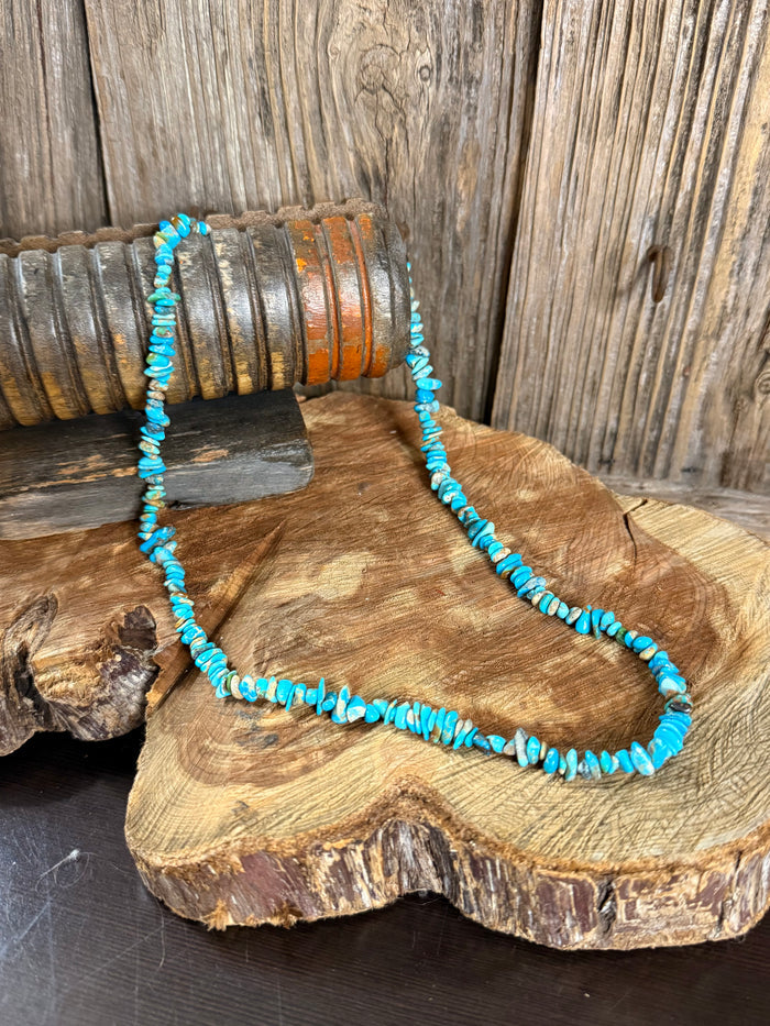 18-inch turquoise chip bead necklace on display stand