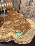 Sterling silver cowhead pendant necklace with turquoise inlay, 20" chain