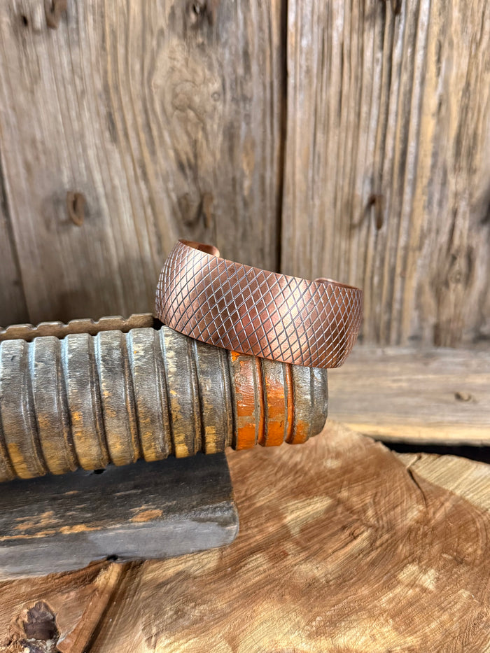 Diamond-hammered copper cuff bracelet with textured check pattern