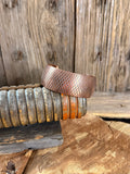 Diamond-hammered copper cuff bracelet with textured check pattern