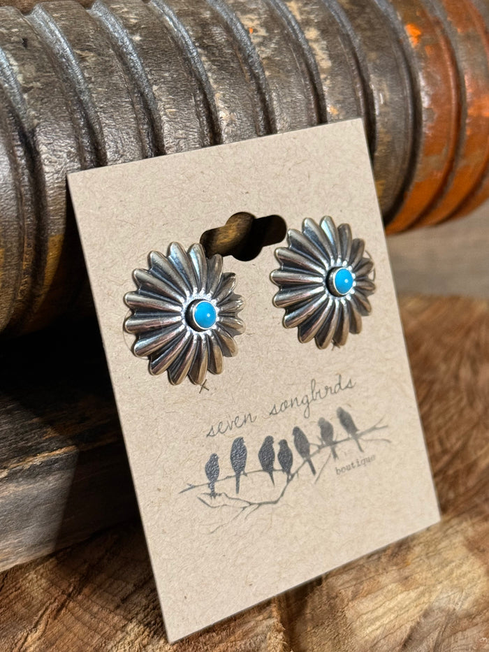 Turquoise concho stud earrings in sterling silver with radial petal design, blue stone