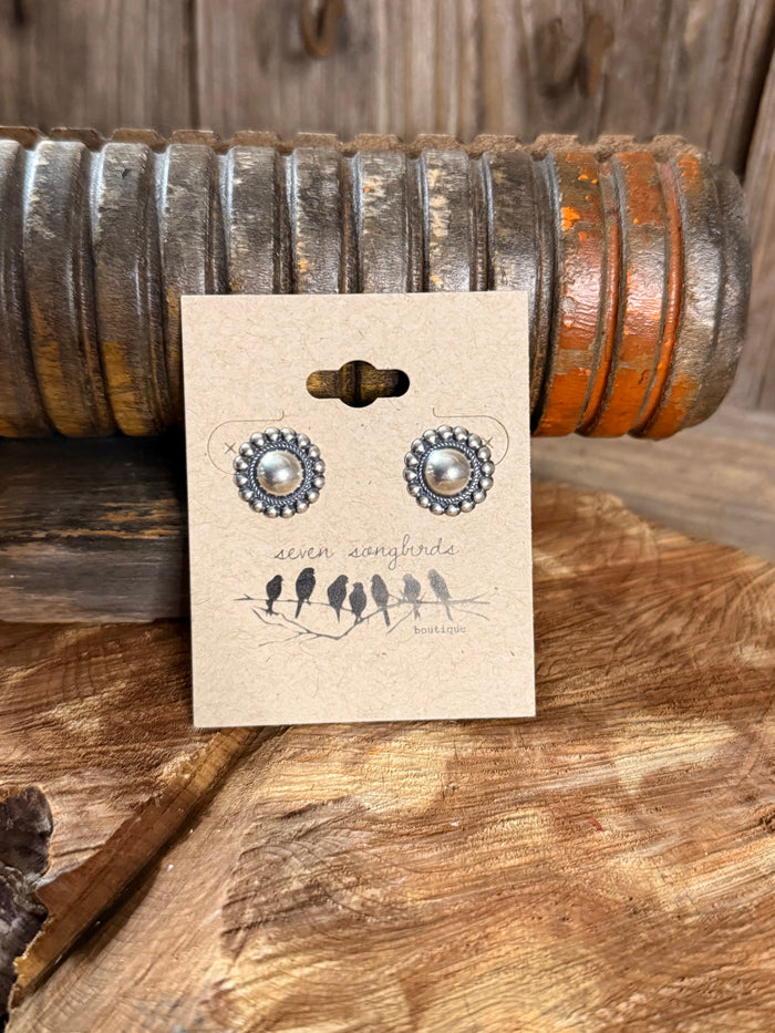 Pair of round silver stud earrings with pearl-like cabochon and beaded rim