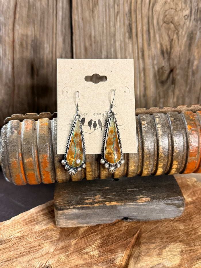 Native Made turquoise teardrop fishhook earrings with silver dot accents