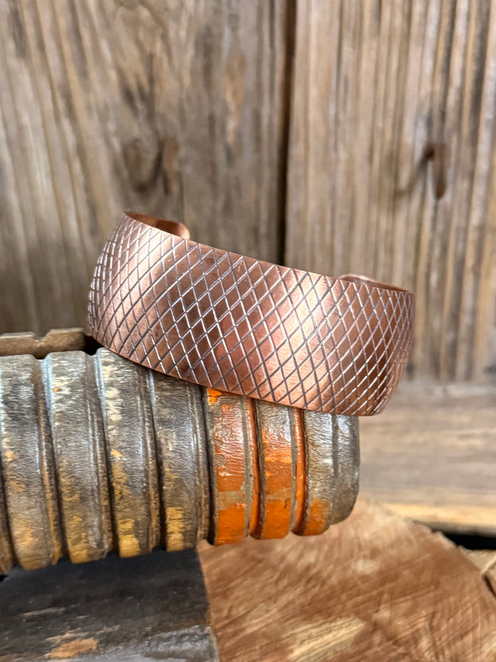 Copper cuff bracelet with wide diamond-hammered texture