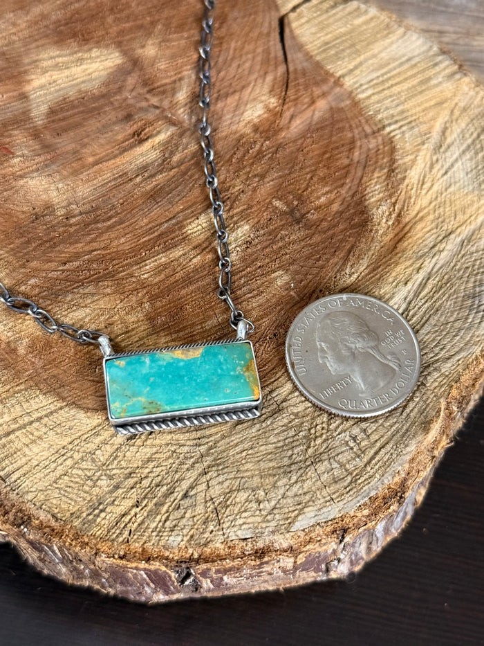 Turquoise bar necklace with turquoise rectangle pendant, size shown with coin