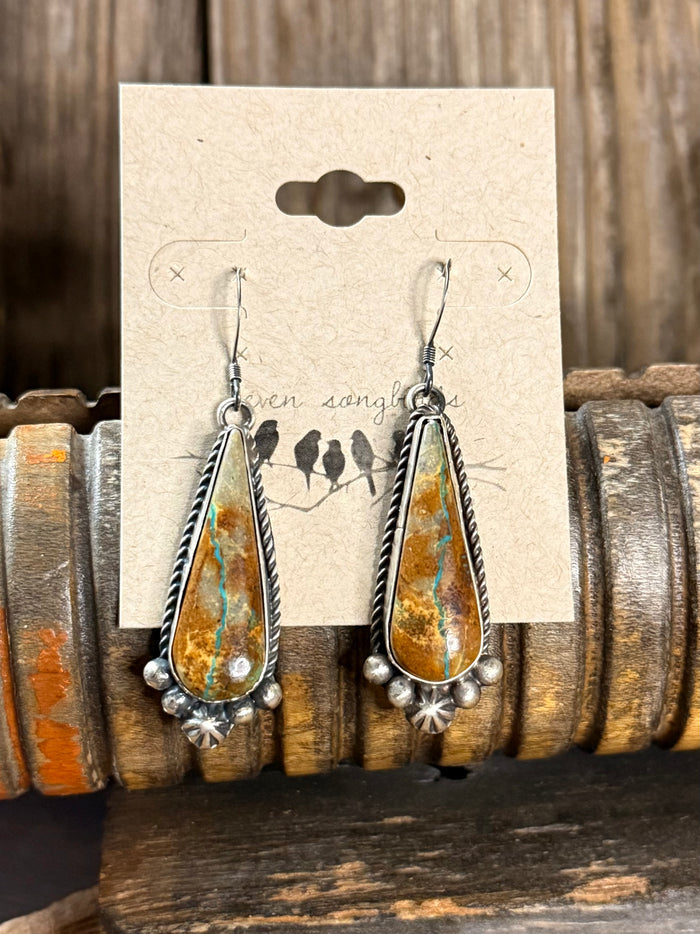 Native Made turquoise teardrop fishhook earrings with star dangles and textured silver