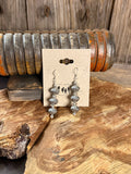 Silver-tone pumpkin bead fishhook earrings, three-tier dangling design