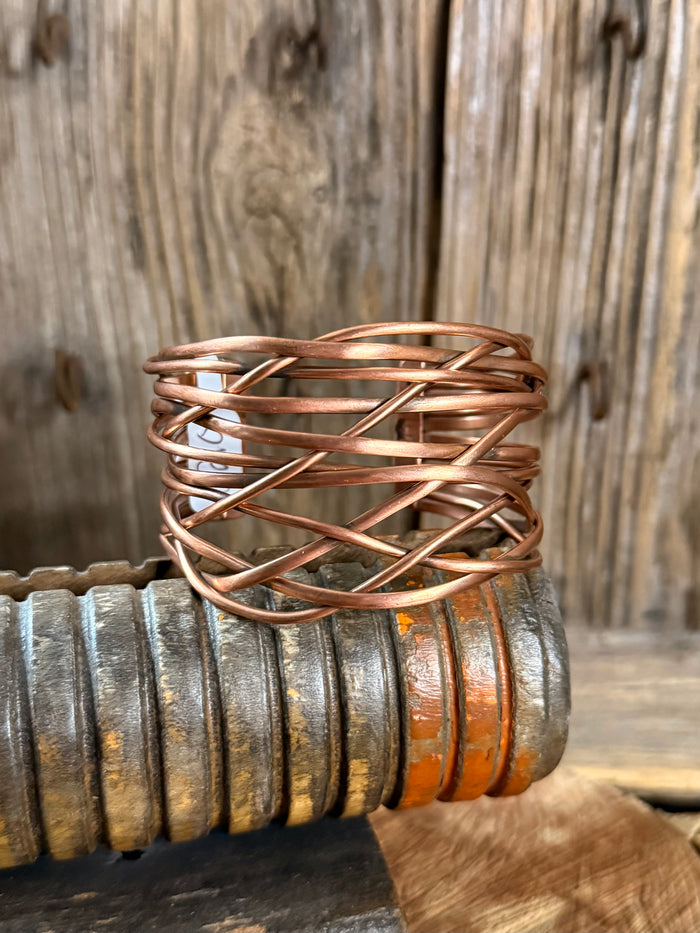 Copper twisted wire cuff bracelet with braided lattice wrap