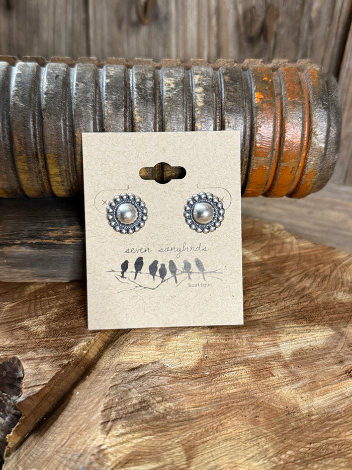 Round silver stud earrings with pearl-like center and bead border