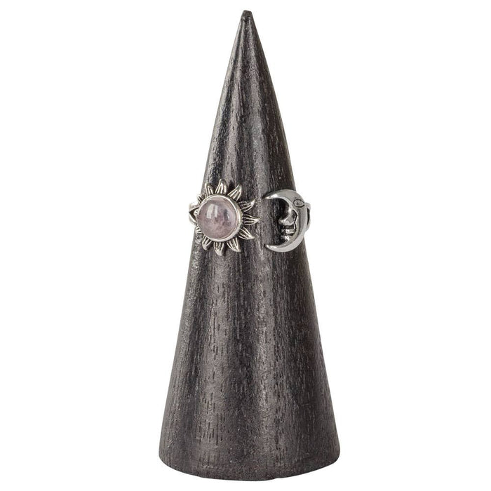 Decorative cone-shaped stand with two rings on a white background