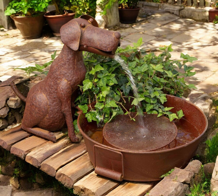 Best friend dog fountain front view showing charming rustic dog figure with aged rusted metal finish over flowing water at GoodStuff Co