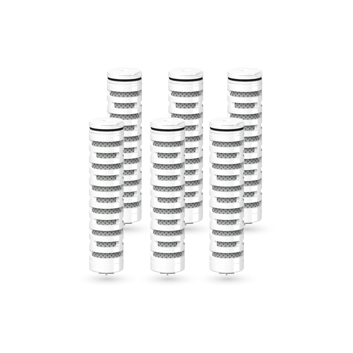 Set of white cylindrical filters with black stripes on a white background