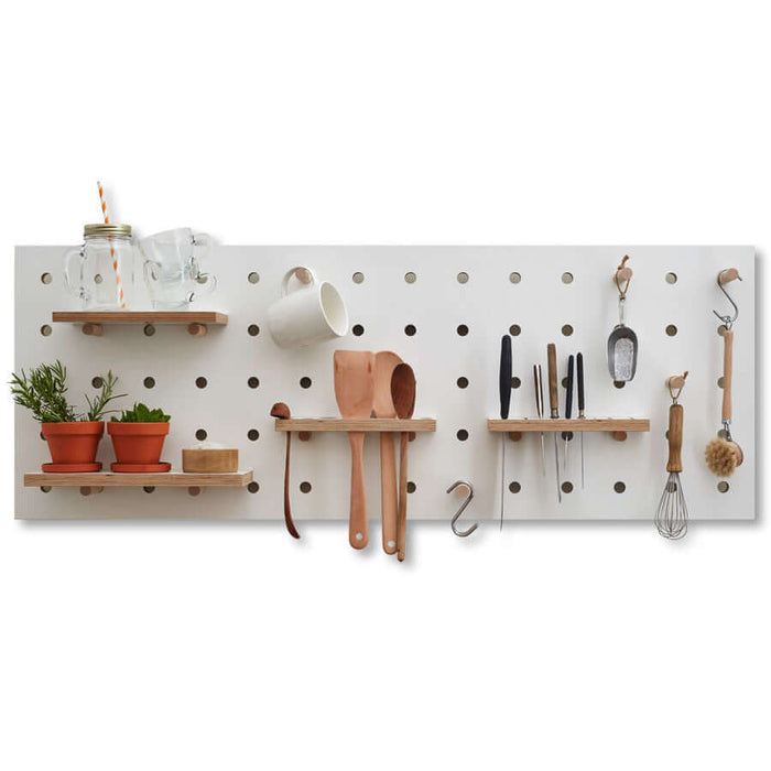 white wooden pegboard for kitchen