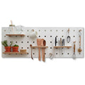 white wooden pegboard for kitchen