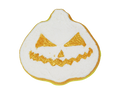 white jackolantern shaped bath bomb with gold eyes nose and mouth