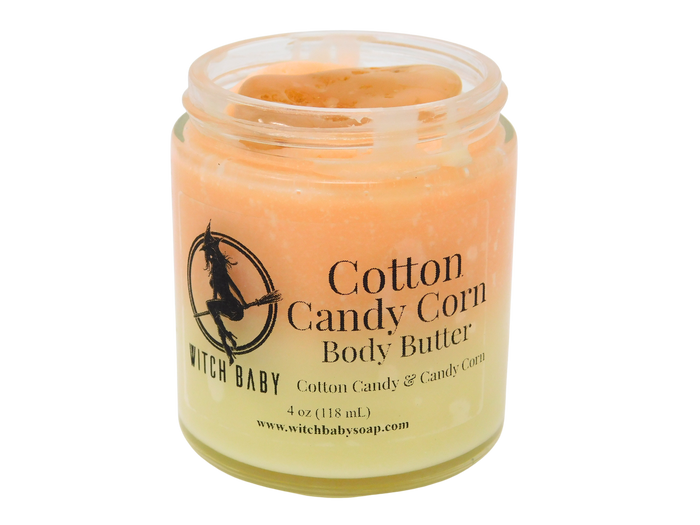orange and yellow body butter topped with yellow agate in a 4 oz glass jar with a clear label that reads: Cotton Candy Corn Body Butter. Cotton Candy & Candy Corn.