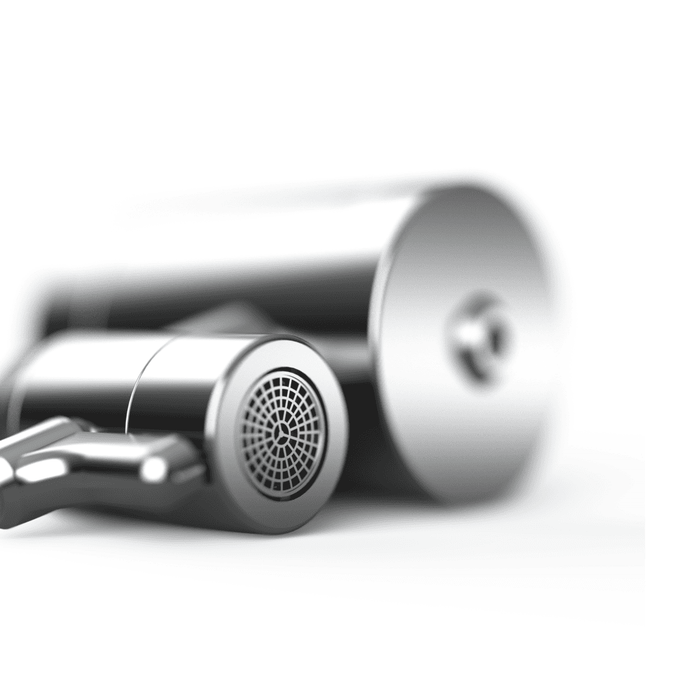 Close-up of a metallic faucet on a white background