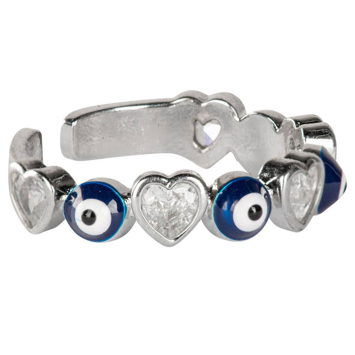 Silver ring with heart and eye-shaped charms on a white background