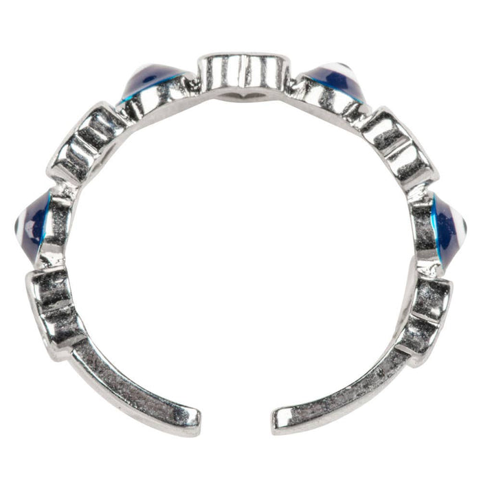 Silver ring with blue gemstones on a white background