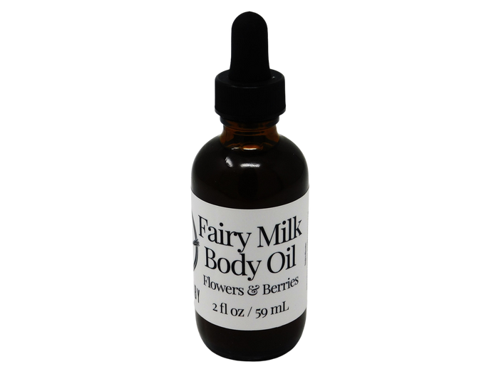 2 oz brown dropper bottle with white label that reads: Fairy Milk Body Oil. Flowers & Berries.