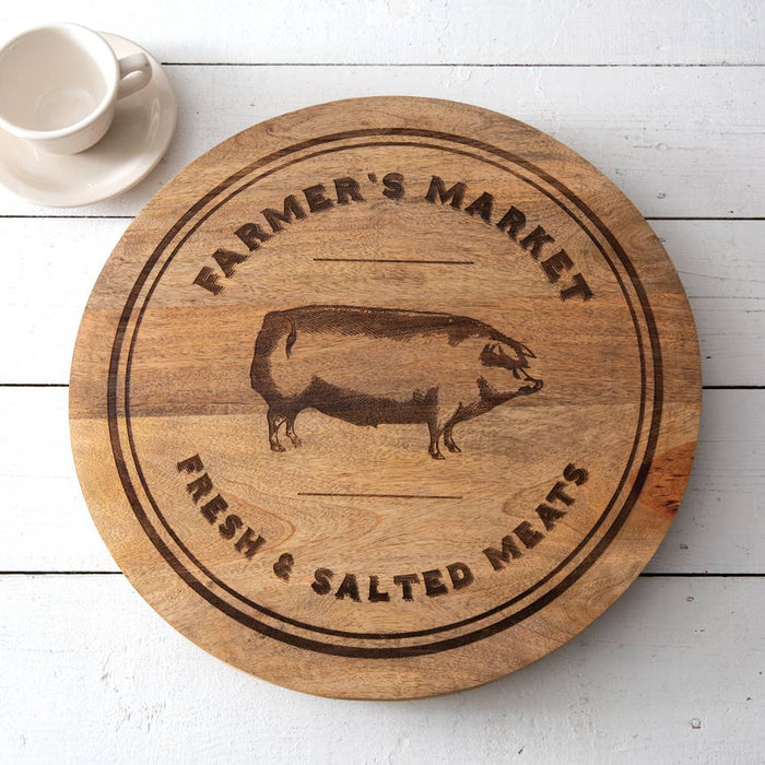 Top-down view of 18-inch Farmer's Market wooden lazy susan showing full pig artwork and rotating turntable base, distressed natural wood finish — rustic farmhouse kitchen and dining room decor