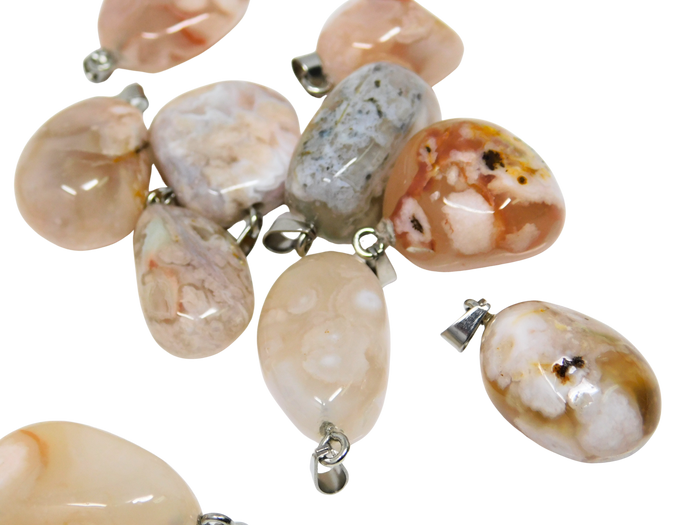 flower agate stone pendants on a white background