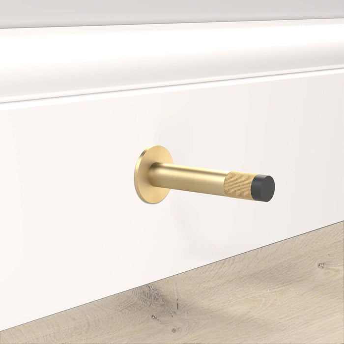 Gold Linear Wall Mounted Door Stop in Gold – installed view