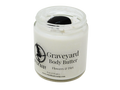 4 oz glass jar containing grey body butter. Topped with smoky quarts stone.