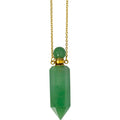Green crystal pendant necklace on a white background