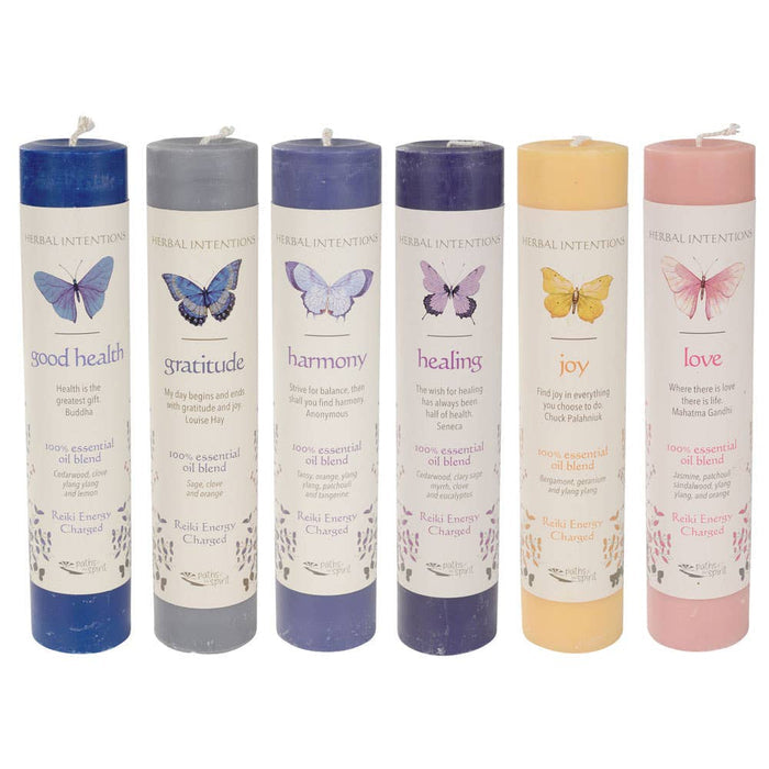 Set of six candles with butterfly illustrations and corresponding words on a white background