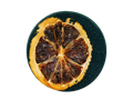 black circle bath bomb with a dried lemon slice on top