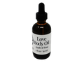 brown glass dropper bottle with label that reads: Love Body Oil. Apple & Rose.