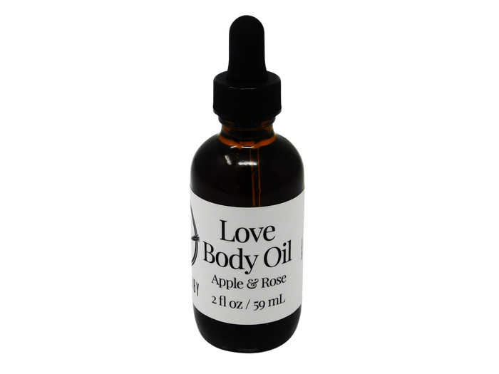 brown glass dropper bottle with label that reads: Love Body Oil. Apple & Rose.
