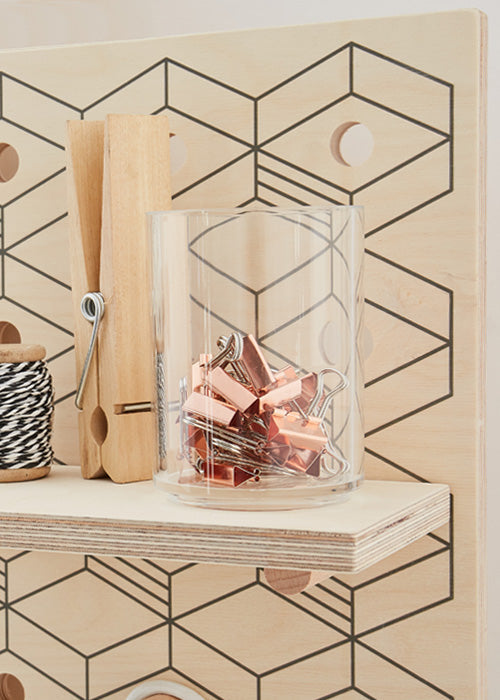 solid wooden pegboard shelf on pegboard pegs with storage container