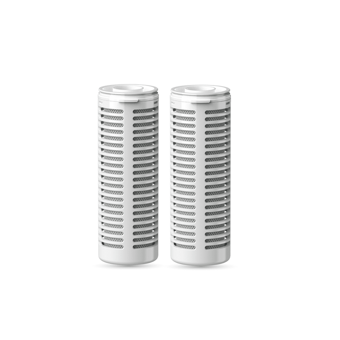 Two white cylindrical filter cartridges on a white background