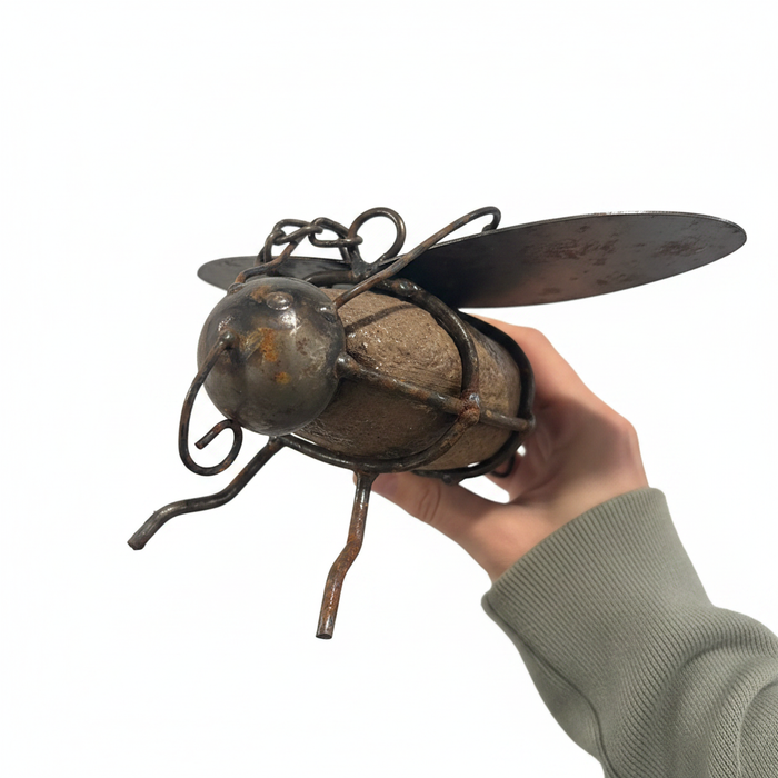 River rock bumble bee garden hanger with custom hand-formed metal wings and heavy hanging chain, weathered patina finish actual size