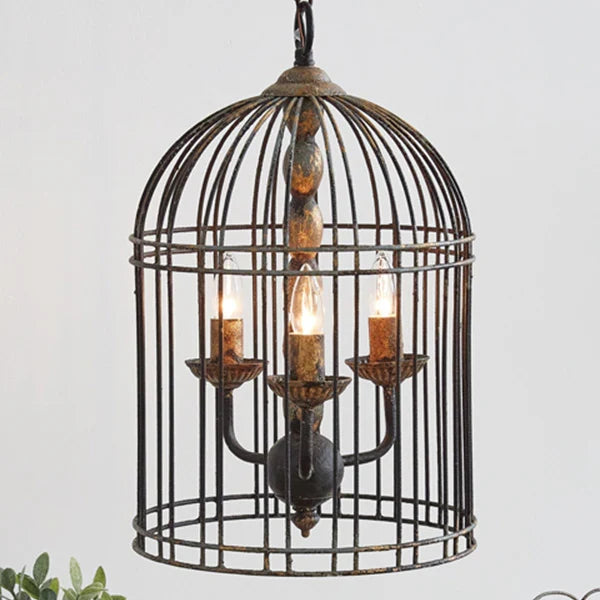Rustic metal bird cage pendant lamp with distressed finish and candelabra bulb holders, hanging by chain