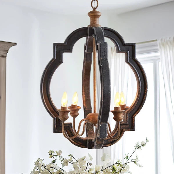 Rustic farmhouse bird cage pendant lamp in distressed metal finish with three candelabra bulb holders, hanging by decorative chain