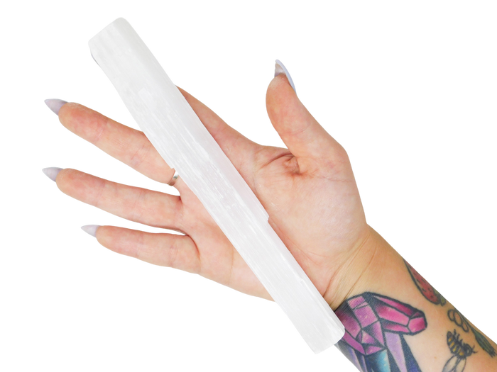 hand holding selenite
