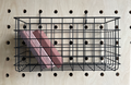 black wire hanging basket for pegboards at kreisdesign
