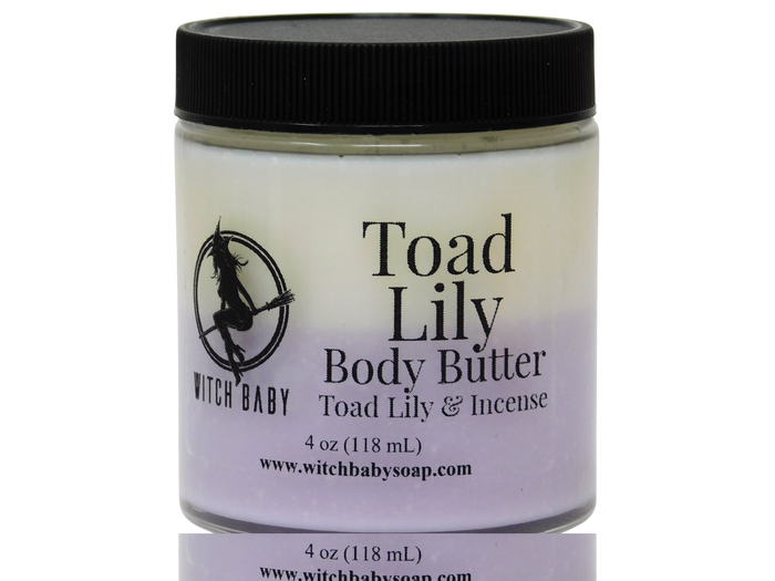 Jar of Toad Lily Body Butter with black lid on a white background