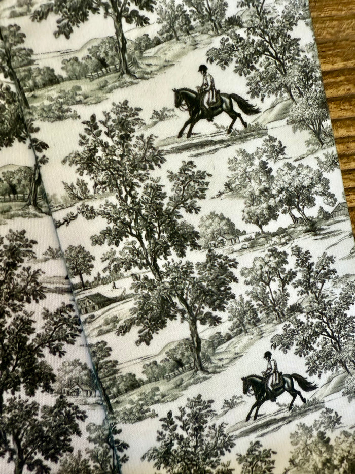 Toile trouser socks with horse-and-rider scene print in dark and cream